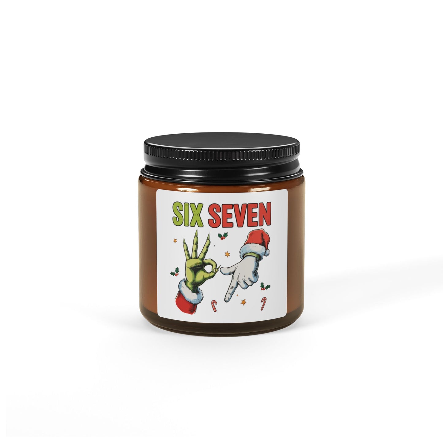 Candle with a decorative label featuring Christmas cartoon hands and 'Six Seven' text on a white background