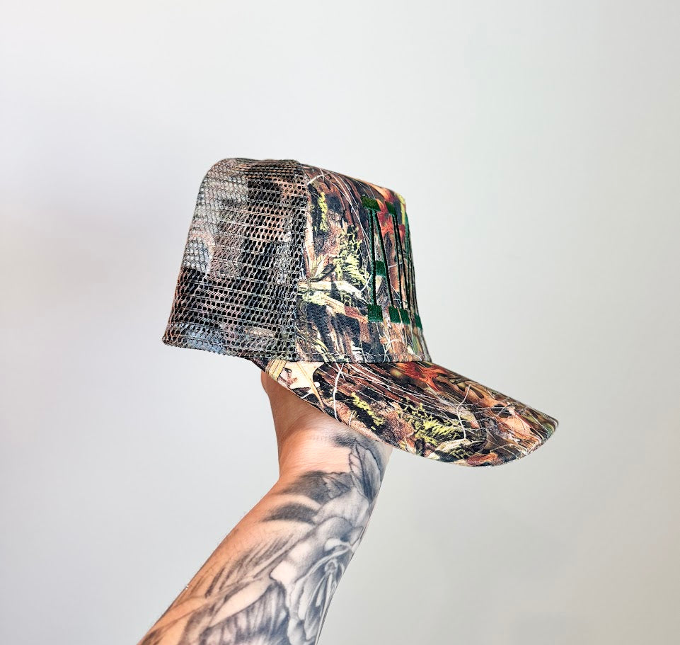 Camo Embroidered 'AMEN.' - David and Young Trucker Hat