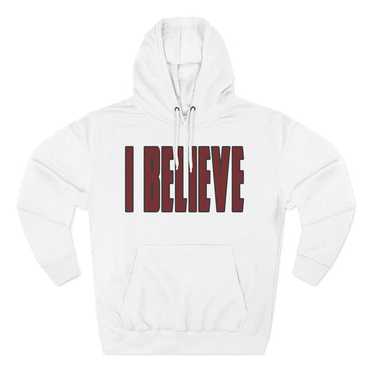 White hoodie in Carolina Gamecock colors with 'I BELIEVE' text in red on a white background