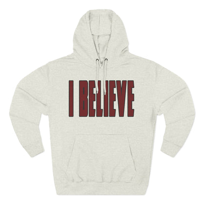 Beige hoodie in Carolina Gamecock colors with 'I BELIEVE' text in red on a white background