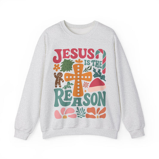Gray sweatshirt with 'Jesus is the Reason' text and Christmas-themed graphics on a white background