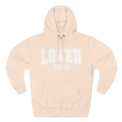 Pink hoodie with 'LOVED John 3:16' text on a white background