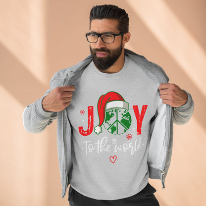 Man wearing a gray sweatshirt with a Christmas design and text on a beige background